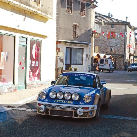 Burbling through Burzet is the Porsche 911 of Jean-Christophe and Stephane Bonoron. Photo: Peter Collins