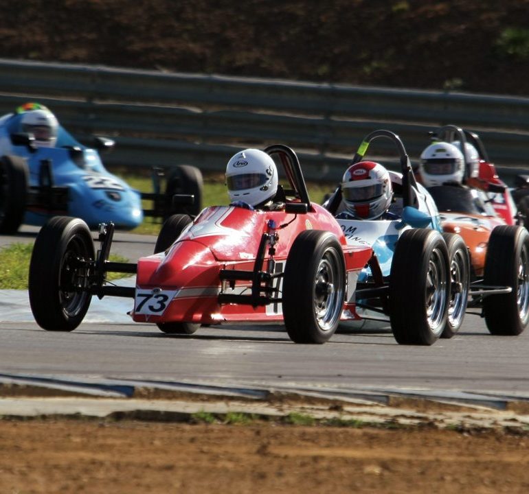 Daniel Bando leads the Formula Vee band in his Elfin NG. Photo: Steve Oom