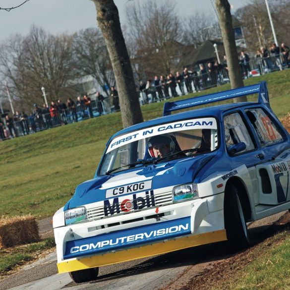 Dave Higgs flings his Metro 6R4 around the event’s rally stage. Photo: Peter Collins