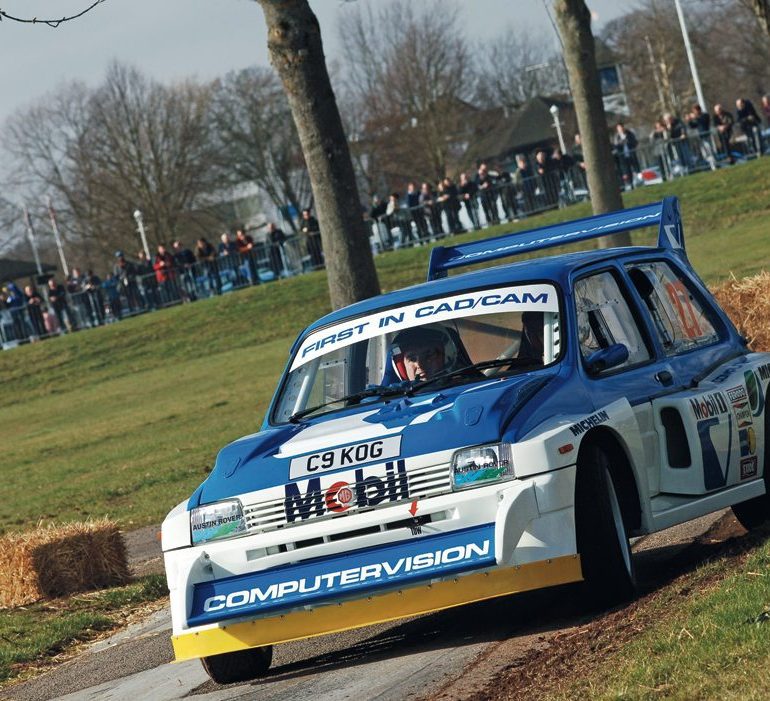 Dave Higgs flings his Metro 6R4 around the event’s rally stage. Photo: Peter Collins