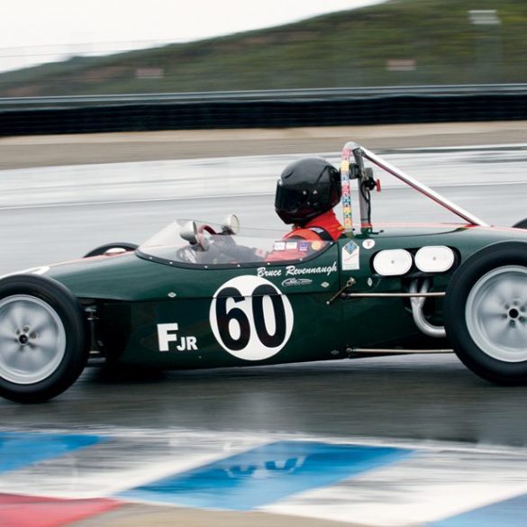 Bruce Revennaugh heads into The Corkscrew with his Lotus 18. Photo: Dennis Gray