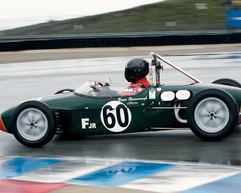 Bruce Revennaugh heads into The Corkscrew with his Lotus 18. Photo: Dennis Gray