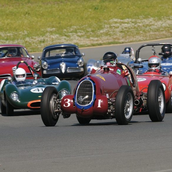 Leading this mixed pack is Peter Giddings’ 1935 Alfa Romeo 8C35. Photo: Jim Williams