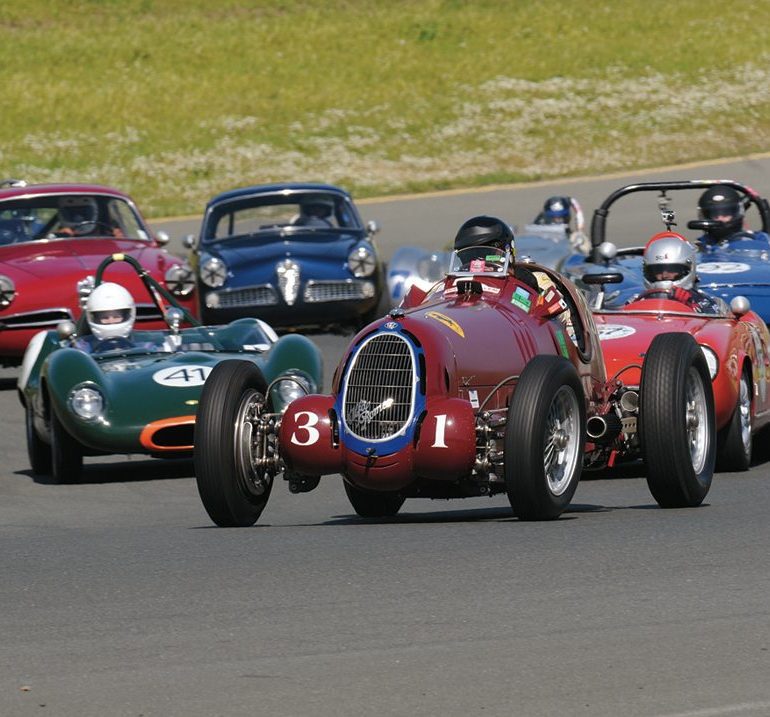 Leading this mixed pack is Peter Giddings’ 1935 Alfa Romeo 8C35. Photo: Jim Williams