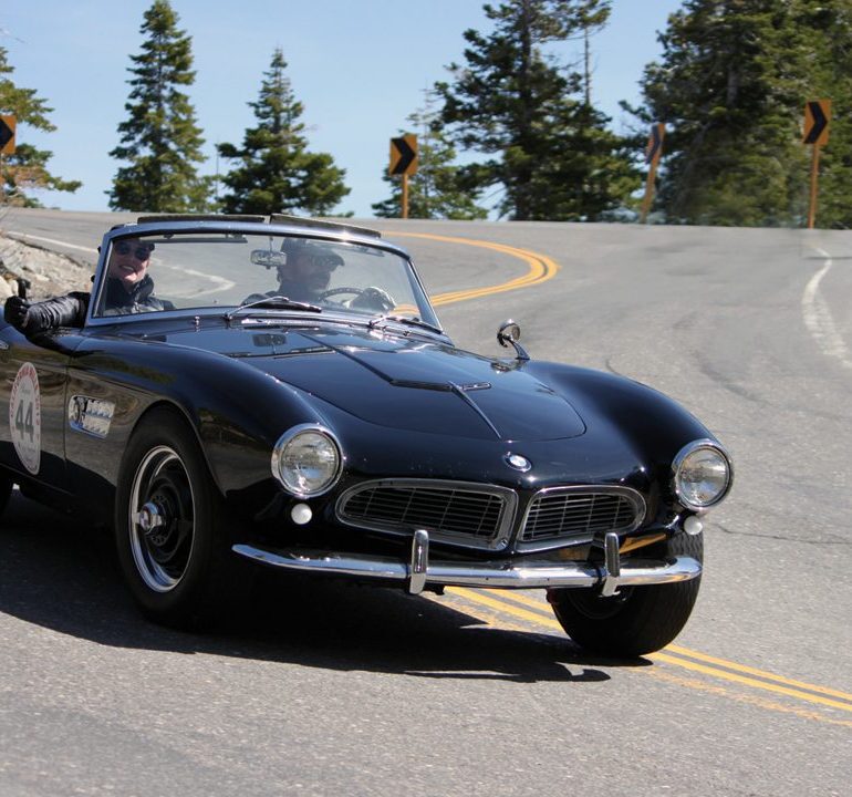 1957 BMW 507 of Scott Morris and Rochelle Jensen circles Lake Tahoe on Day 2.