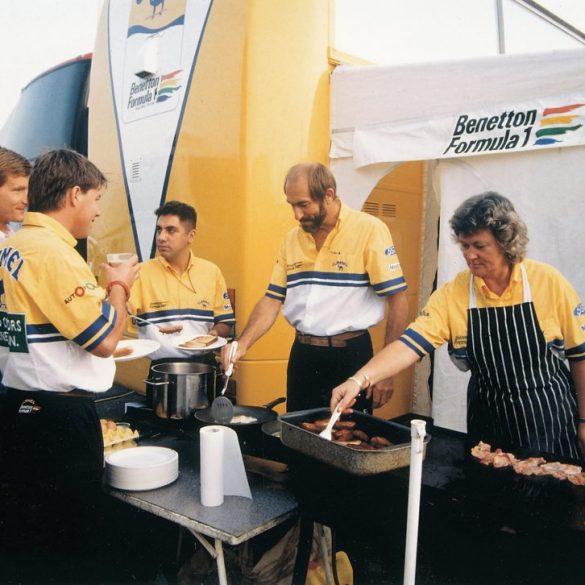 Di and Stuart Spires at work cooking up lunch for the team during their days with Benetton. Photo: Spires Collection