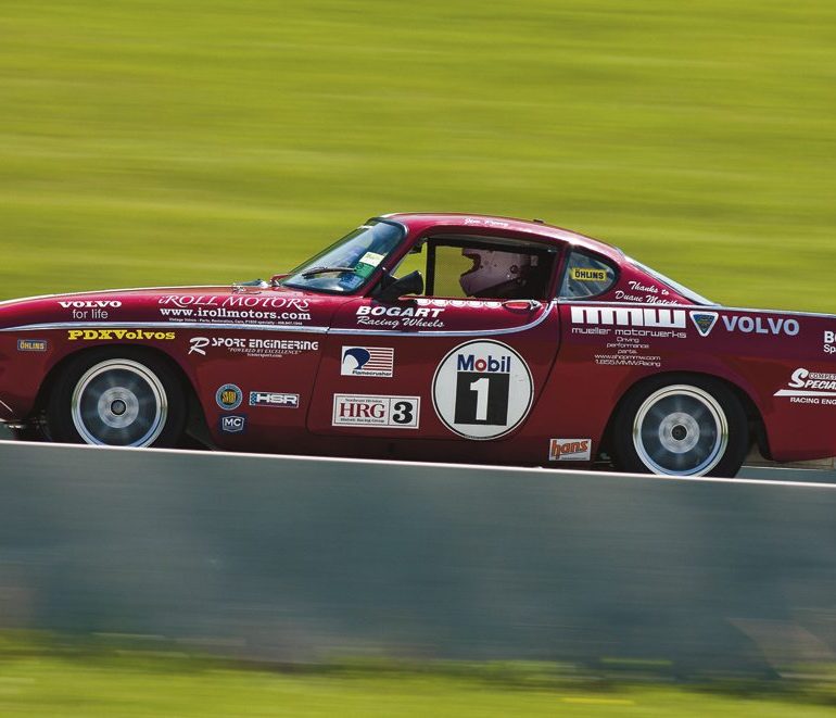 James Perry at speed in his well-supported 1962 Volvo P1800. Photo: JR Schabowski