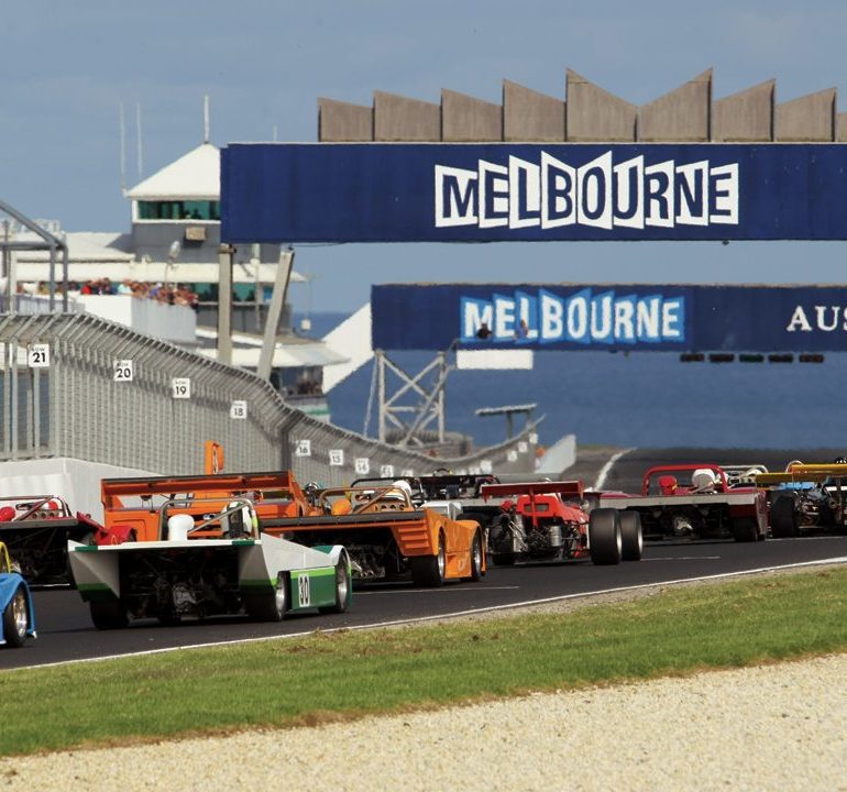 The field of F1 cars and big-banger sports cars about to set off toward the Southern Ocean. Photo: Steve Oom