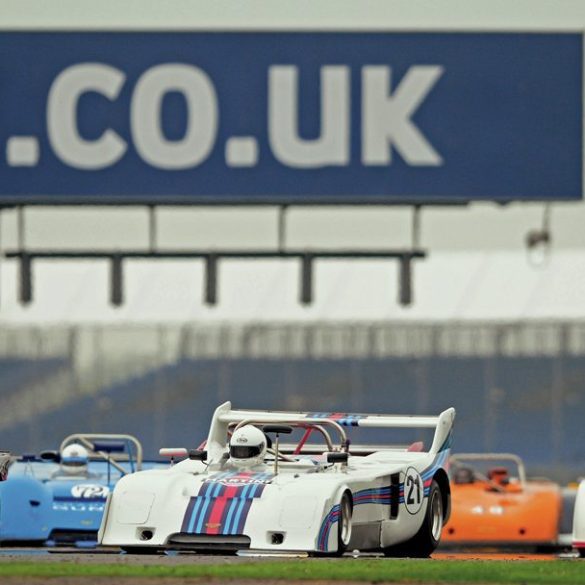 Martini Trophy start with James Dodd’s appropriately liveried Chevron B31 leading the way. Photo: Peter Collins