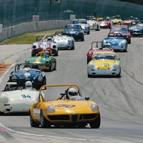 Mike Besic’s 1969 Alfa Romeo Spider leads the Group 2 field into Turn 5. He finished 1st in Sunday’s feature race. Photo: Jim Hatfield