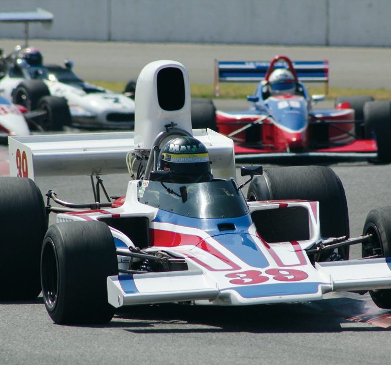 Tom Malloy’s 1974 Lola T332 leads Paul Morgan’s 2002 Dallara Indy Lights (#89), Robert Merritt’s 1985 Ralt RT-5 Super Vee (#33) and Tony Adamowicz’s 1969 Eagle F5000 (#7) during Saturday morning Qualifying Practice. Photo: Craig R. Edwards