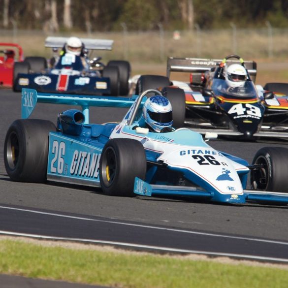 The Ralt RT4 of Geoff Calvert is chased by Ian Buddery’s Lola T700. Photo: Steve Oom