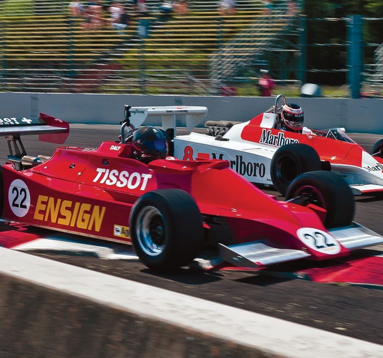 Bud Moeller takes his Ensign 1979 N179 inside Sean Allen’s 1980 McLaren M30. Photo: Jeff Mach