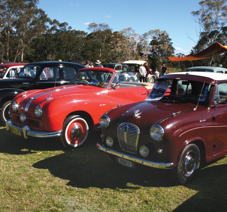 An Austin A90 Atlantic next to a drophead Austin A30.