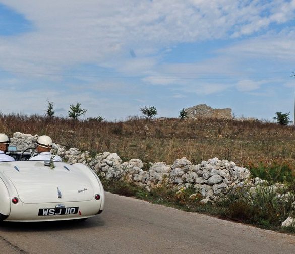 Jetze Visser and Olf Boesjes Healey 100S in typically rugged Sicilian scenery. Photo: Peter Collins