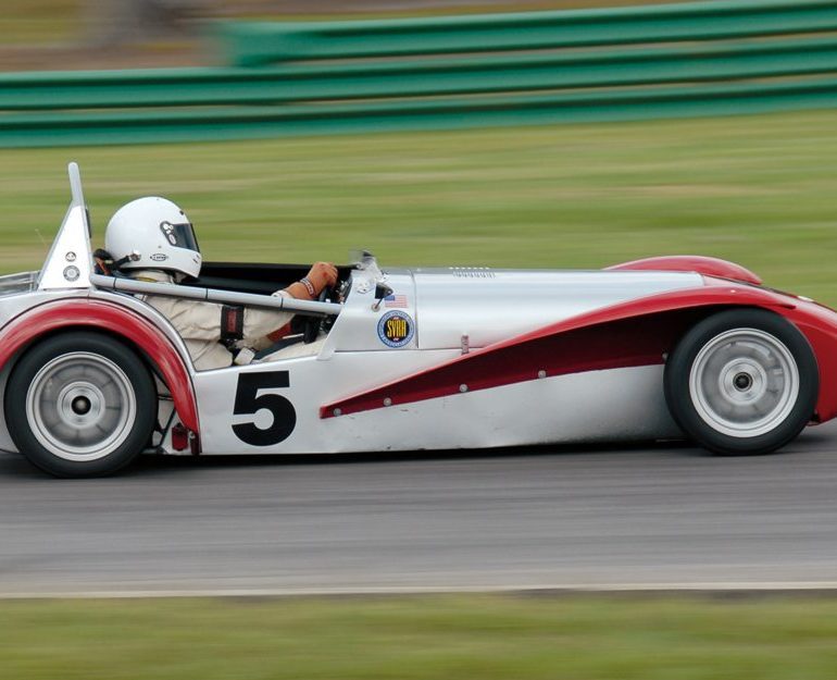 Craig ChimaÕs 1962 Lotus Super 7 enters Turn 4.Photo: Fred Lewis Fred Lewis