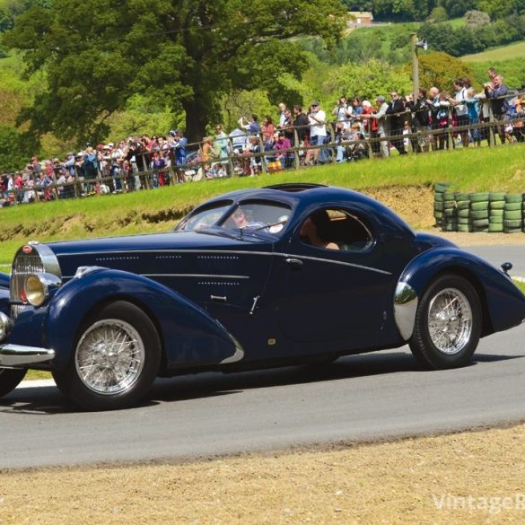 The sleek elegance of a Bugatti Atlantic Type 57SC rounds ÒEttores BendÓ at the Prescott Hillclimb.Photo: Simon Wright