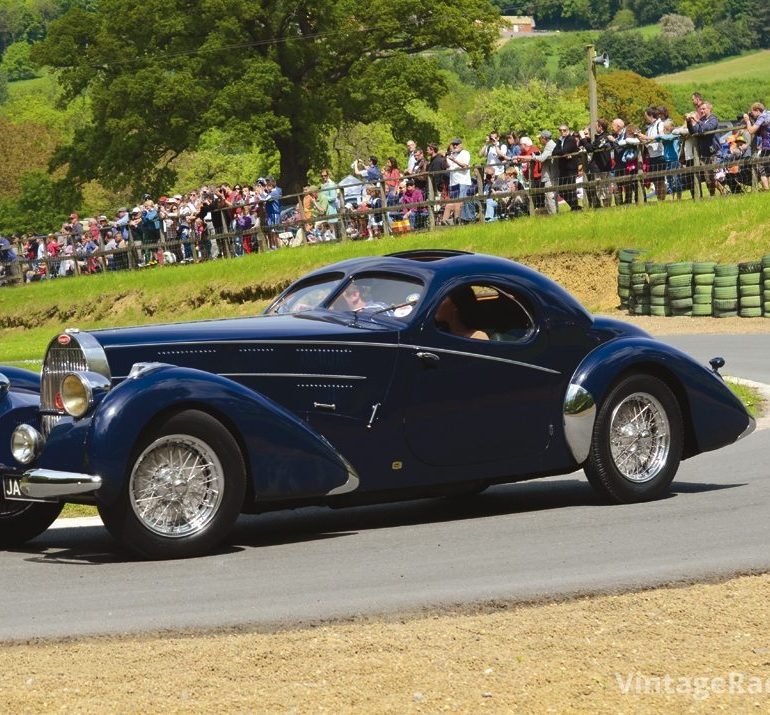 The sleek elegance of a Bugatti Atlantic Type 57SC rounds ÒEttores BendÓ at the Prescott Hillclimb.Photo: Simon Wright