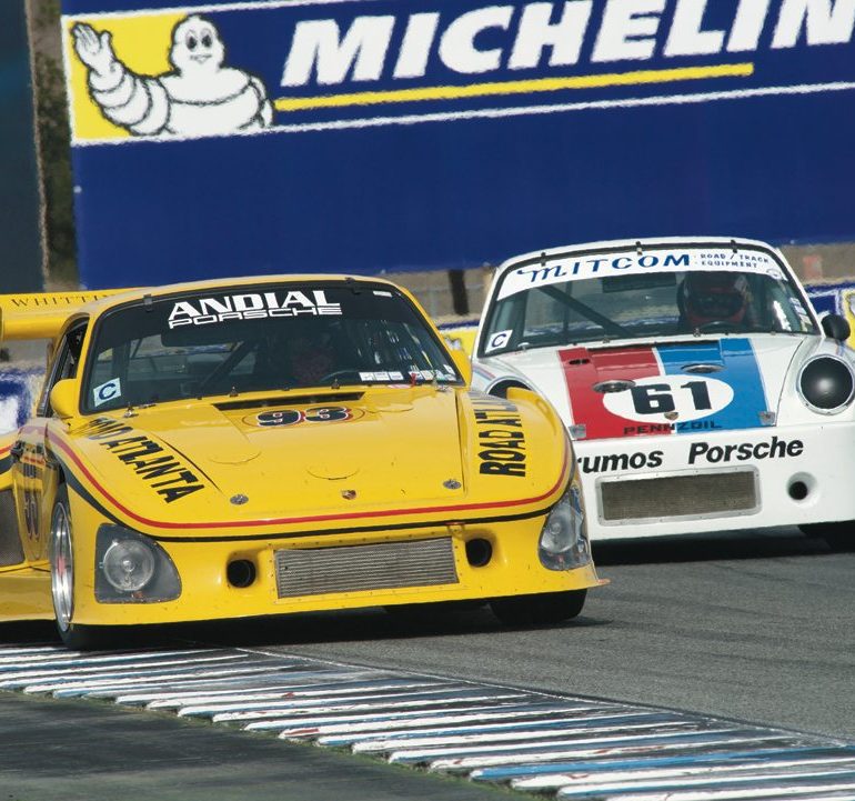 Steve Schmidt keeps his 1976 Porsche 935 K3 ahead of Bradley Harris in ex-Brumos Carrera RSR. Photo: Dennis Gray