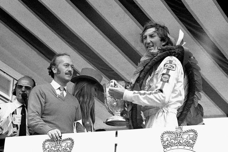 Jochen Rindt (right) and Lotus boss Colin Chapman celebrate the Austrian’s 1970 British Grand Prix victory. Photo: Maureen Magee