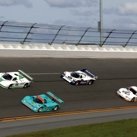 Two 962s, a Jag and an Olds Aurora on the banking. Photo: Martin Spetz