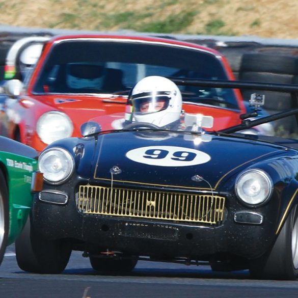 Colin Dodds mixes it up with his 1967 MG Midget. Photo: Jeremy Dale