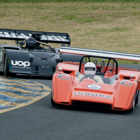 Nick Colonna (1969 McLaren M8C) fends of the attentions of Fred Cziska (1972 Shadow Mk3) in Turn Two. Photo: Dennis Gray