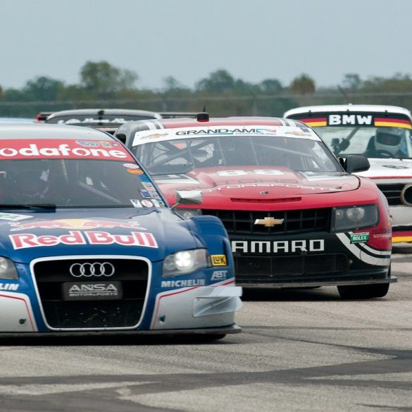 Eric Johnson’s 2006 Audi A4 DTM dices with Henri Sicotte’s 2010 Camaro GTR and Andre Herke’s 1968 BMW 2002. Photo: Chuck Andersen