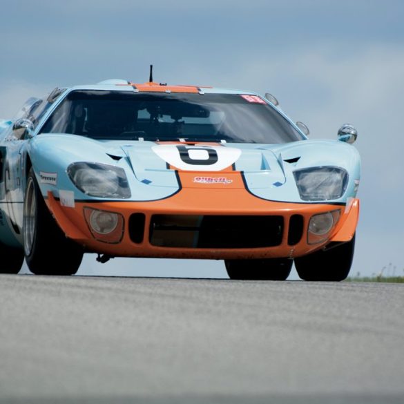 Mac McCombs’1968 Ford GT40 Mk1, crests the hill at Turn 2. Photo: Fred Sickler