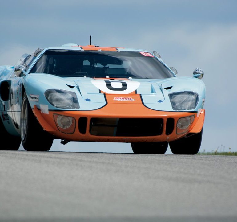 Mac McCombs’1968 Ford GT40 Mk1, crests the hill at Turn 2. Photo: Fred Sickler