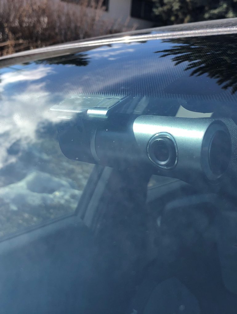 Dashcam mounted on front windshield