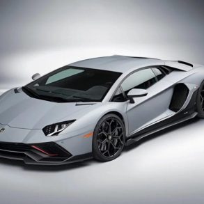 A view of a silver Lamborghini Aventador LP780-4 Ultimae, in studio lighting.