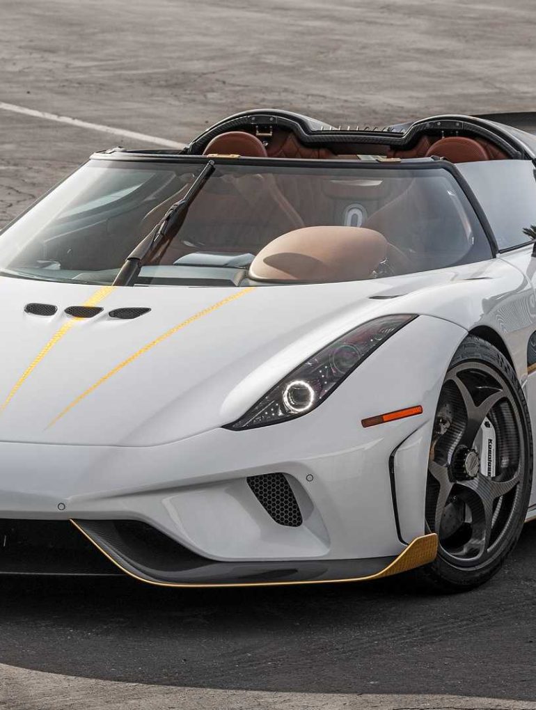 Front view of white 2019 Koenigsegg Regera parked on road