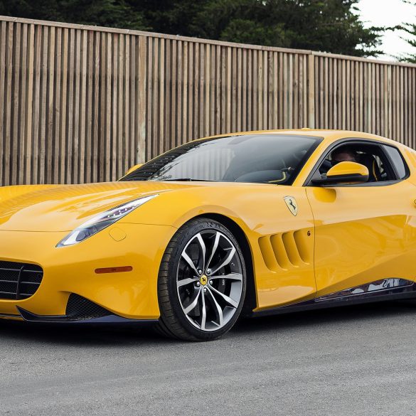 Yellow Ferrari SP 275 RW Competizione parked on road