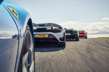 Image showing the partial rear view of some supercars.