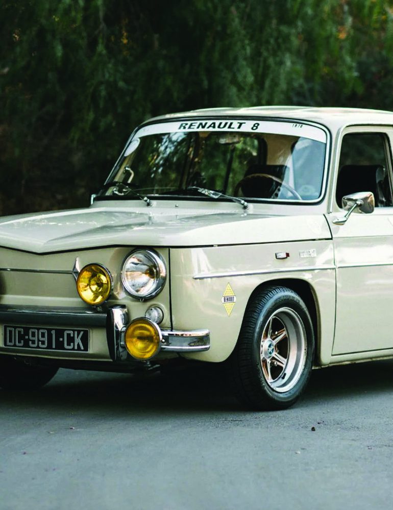 Renault 8 as vintage rally car with yellow fog lights