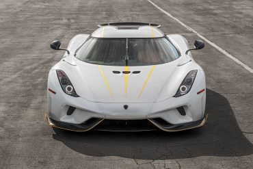 Front view of the Koenigsegg Regera finished in Crystal white with gold detailing.