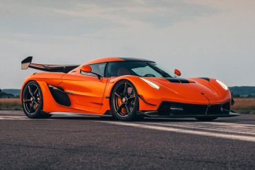 Front angled shot of an orange Koenigsegg Jesko