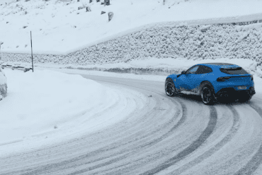 Ferrari Purosangue drifting in the Italian snow