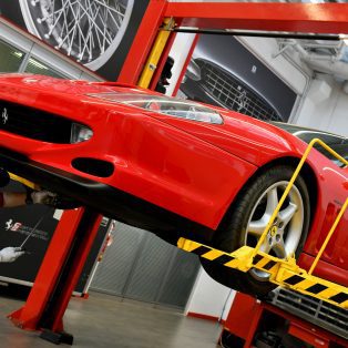 Ferrari on lift for maintenance